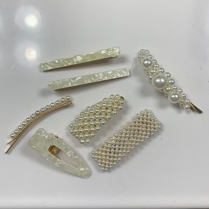Assorted pearl hair clips and pins